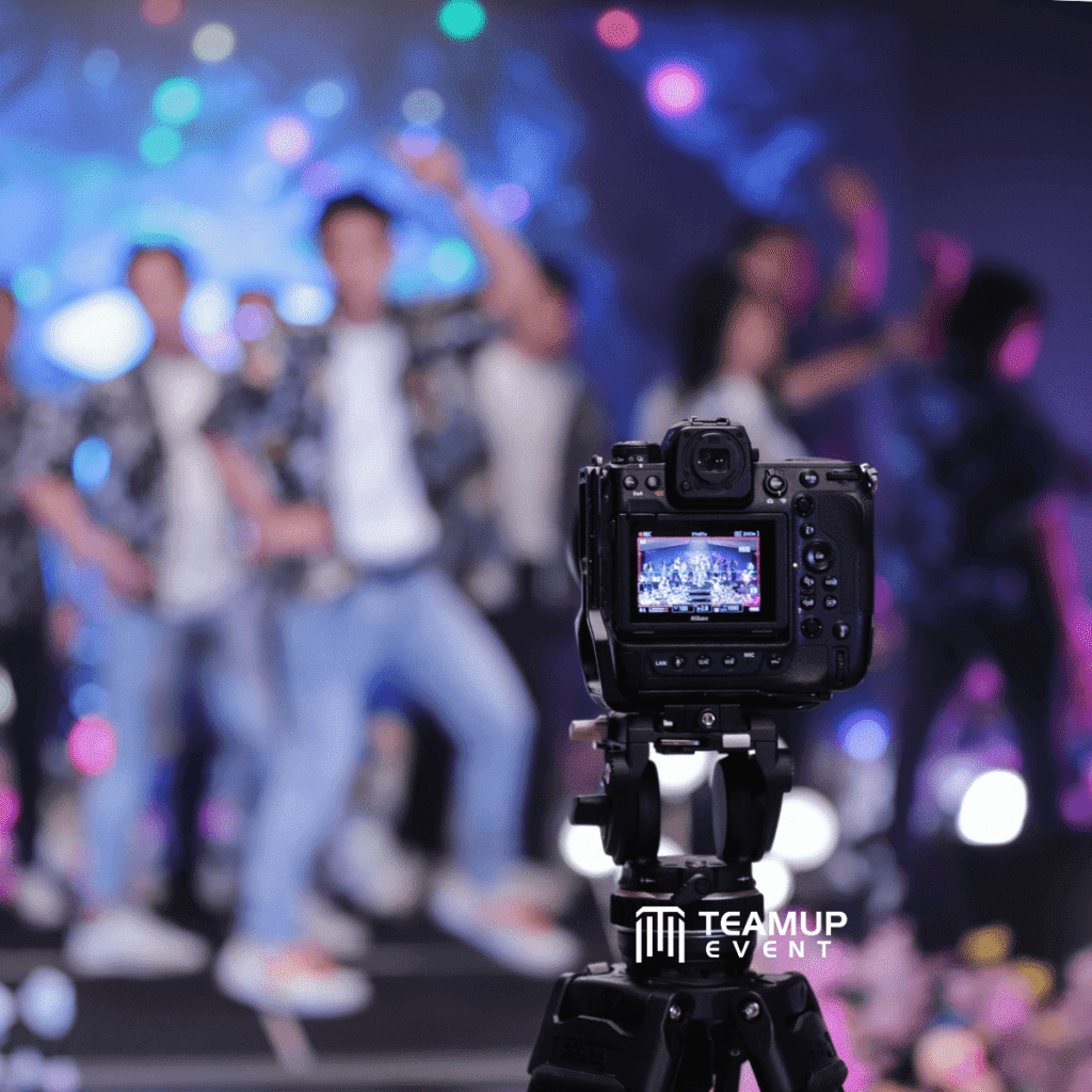 camera setup pointing at stage performers