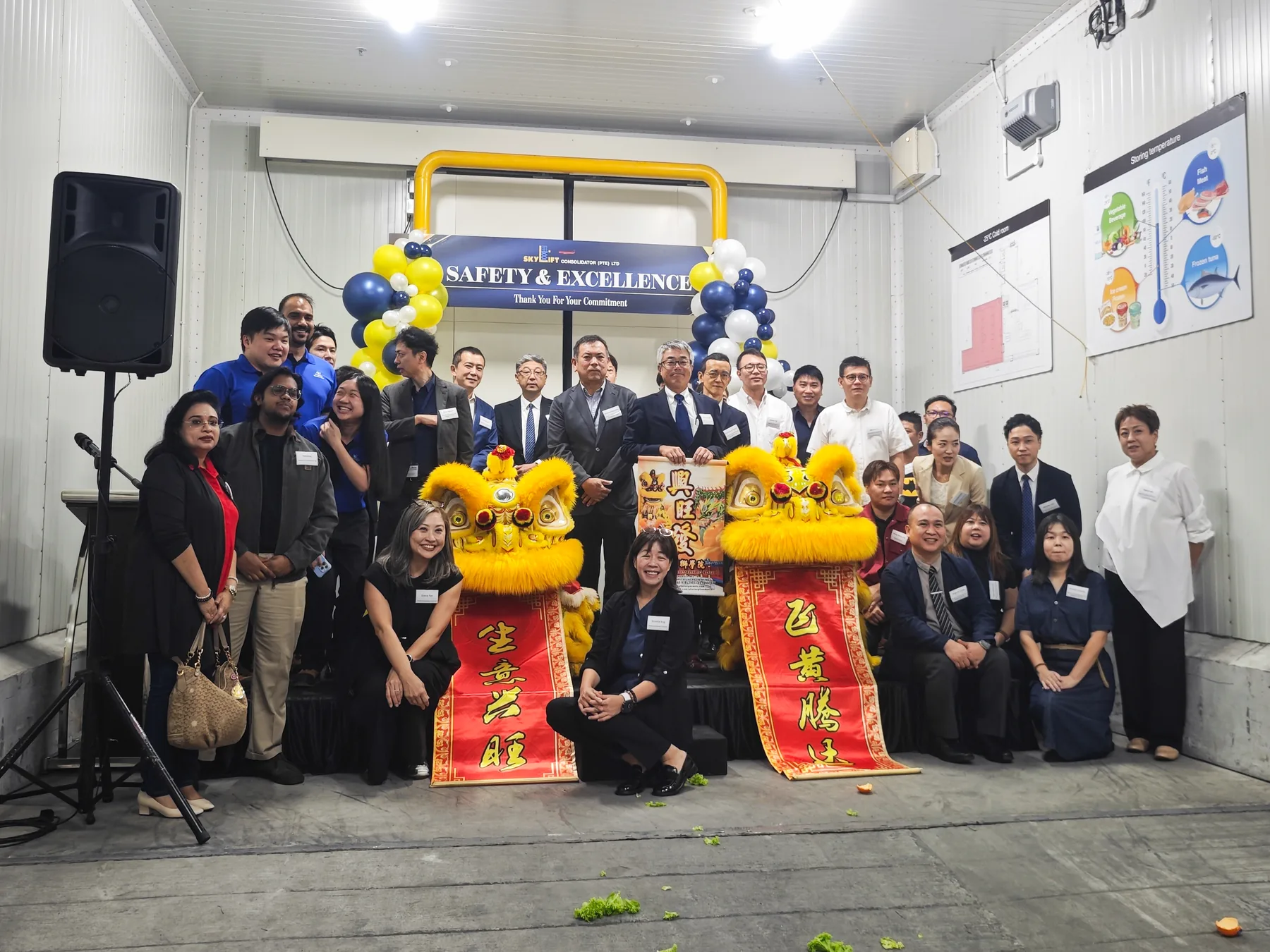 Group photo with lion dance at Skylift opening ceremony
